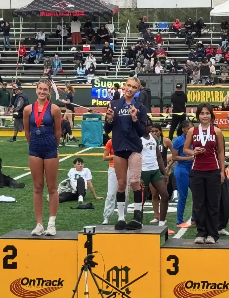 High School Girl Poses On First-Place Podium Despite Losing To Trans Athlete